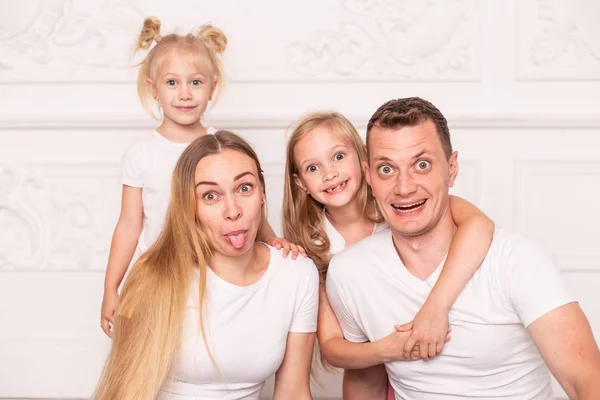 Young family gather and fooling around for photo at fathers day Stock Photo