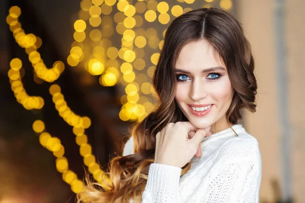 Young Beautiful Woman White Sweater Posing Room Golden Lights — Stock Photo, Image