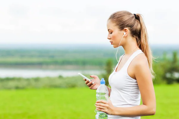 Portrait Young Sporty Woman Holding Bottle Water Listening Music Earphones — Stock Photo, Image