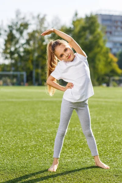 Little Girl Doing Fitness Outdoor — Stock Photo, Image