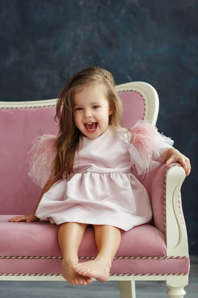 Cute Little Model Pink Dress Sitting Sofa — Stock Photo, Image