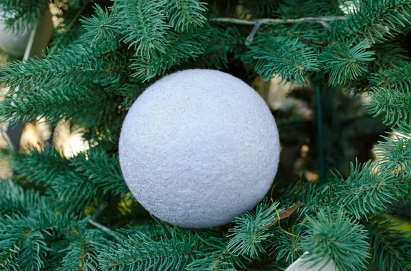 Green branches of the Christmas tree decorated with toys. — Stock Photo, Image