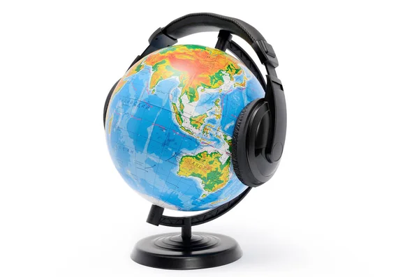 Globe with headphones isolated on white background. — Stock Photo, Image
