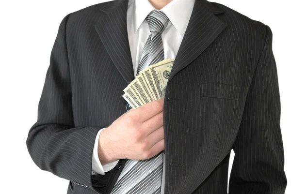 Homme en costume d'affaires noir, tenant de l'argent dans les mains — Photo