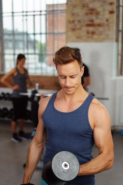 Man in blue tank top — Stockfoto