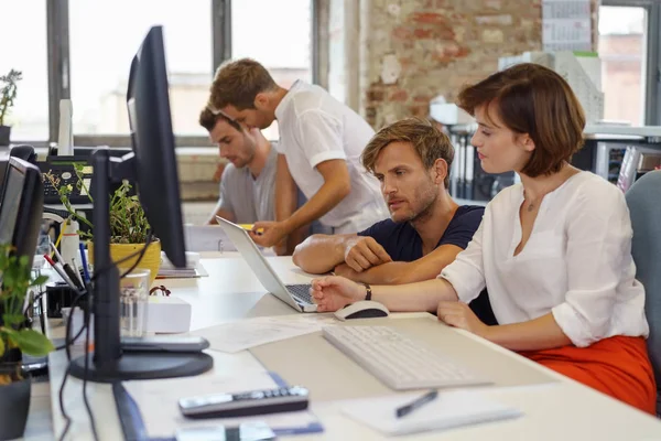 Colleagues working in modern office — Stock Photo, Image