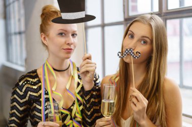 Party goers use playful accessories and drink clipart