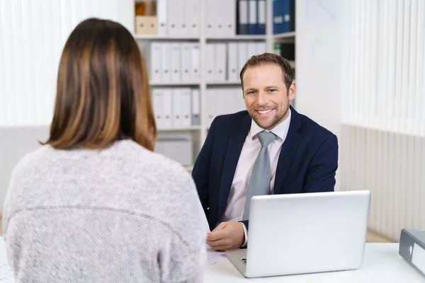 Businessman working with client — Stock Photo, Image
