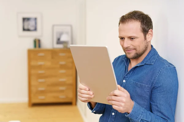 Man with big tablet computer — Stock Photo, Image