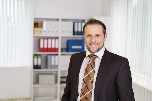 Businessman with brown tie — Stock Photo, Image