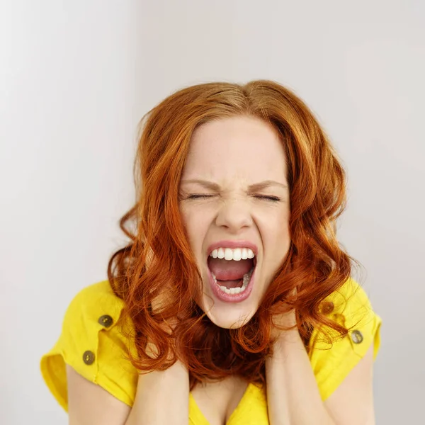 Redhead screaming messy doctor
