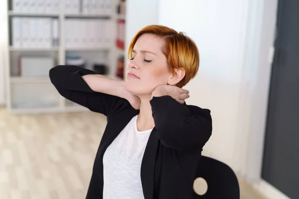 Stressed young businesswoman — Stock Photo, Image