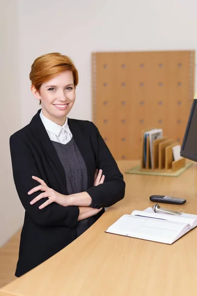 Receptionist with welcoming smile — Stock Photo, Image