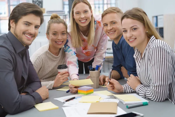 Friendly smiling young business team — Stock Photo, Image