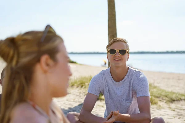 Young Man Friends Relaxing Beach Royalty Free Stock Images