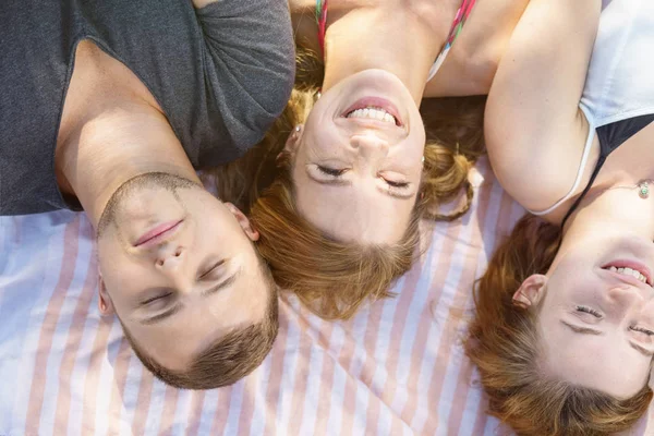 Young Friends Enjoying Quiet Moment Together Royalty Free Stock Photos