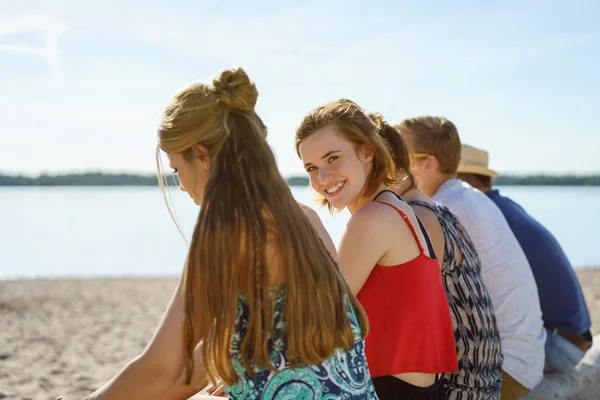 Young Friends Relaxing Group Seaside Royalty Free Stock Photos