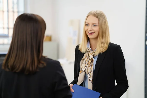 Hopeful young woman in a job interview — Stock Photo, Image