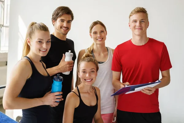 Several Different People Looking Camera Brightly Lit Room — Stock Photo, Image