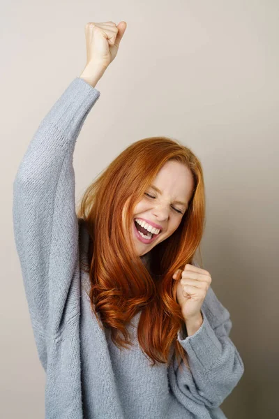 Excited exuberant young woman cheering — Stock Photo, Image