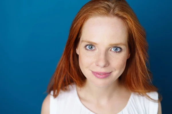 Gorgeous intense young redhead woman — Stock Photo, Image