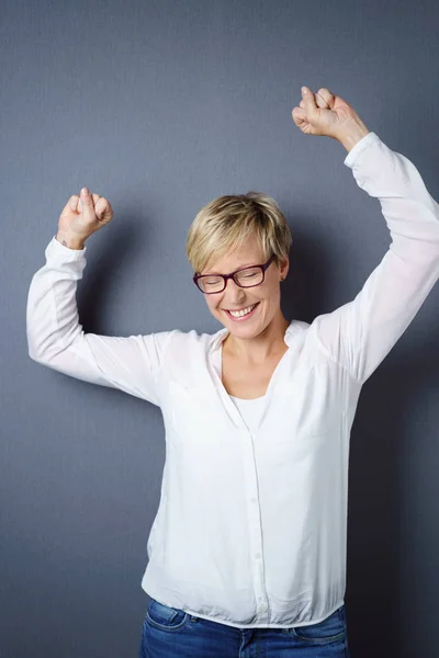 Happy excited young woman cheering — Stock Photo, Image