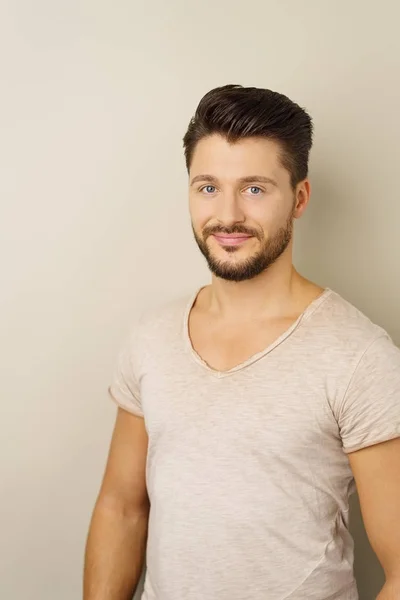 Young bearded man smiling at camera — Stock Photo, Image