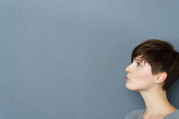 Thoughtful attractive young woman — Stock Photo, Image