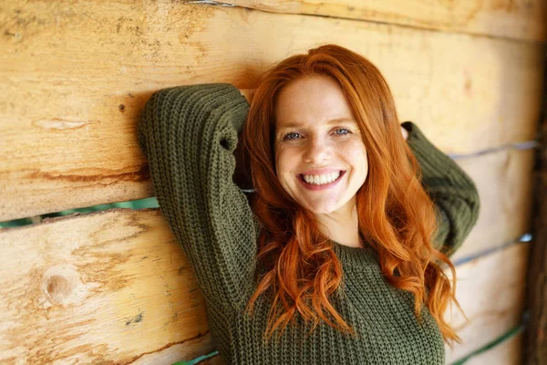 Happy vivacious young redhead woman — Stock Photo, Image