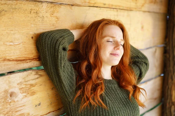 Young red-haired relaxed woman — Stock Photo, Image