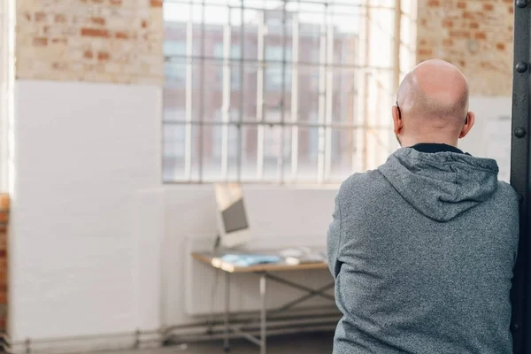 Rear view of a bald middle-aged man — Stock Photo, Image