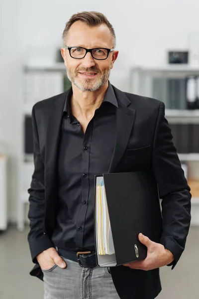 Successful Businessman Carrying Office Binder His Arm Stands Smiling Camera — Stock Photo, Image