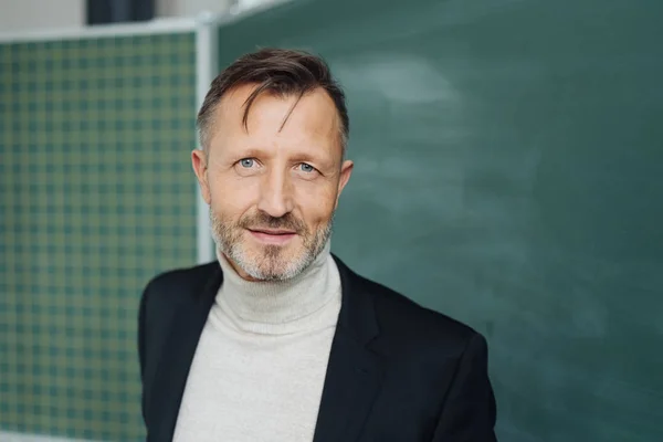 Professor Male Teacher Classroom Standing Front Chalkboard Looking Camera Thoughtful — Stock Photo, Image