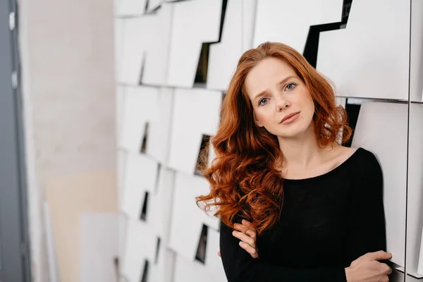 Pretty serious redhead woman — Stock Photo, Image