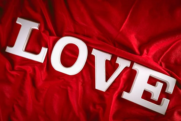 Красный фон с буквами, концепция любви — стоковое фото