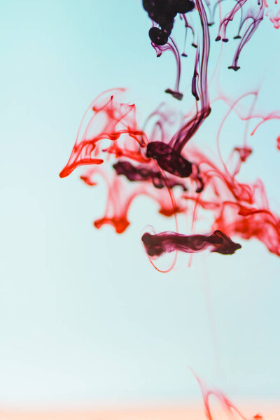 Red ink in water, artistic shot, abstract background