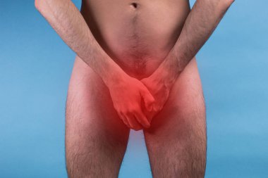 Adam apış arasını kapatıyor. Erkek hastalığı kavramı. Prostat kanseri. İktidarsızlık.