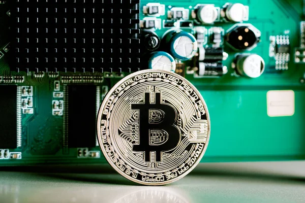 bitcoin coin on the electronic Board of the video card