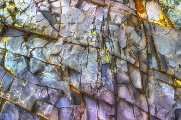 Alt çökeller duvardan çok renkli kaya — Stok fotoğraf