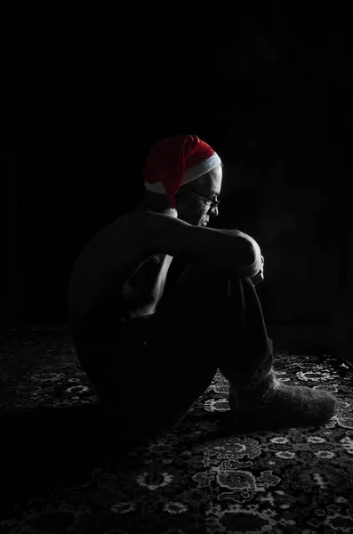 Weihnachten eines einsamen Menschen. — Stockfoto
