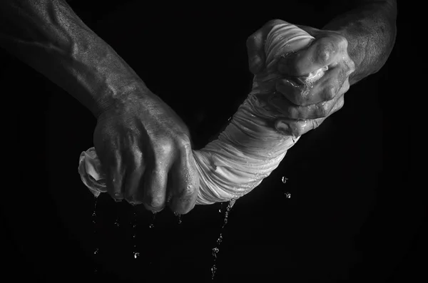 Men's hands and laundry. — Stock Photo, Image