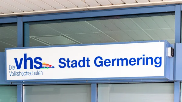 Municipal Germering, District Furstenfeldbruck, Upper Bavaria, Germany: Label of VHS Stadt Germering (Community Collage) — Stock Fotó