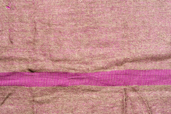 Pink color wrinkled fabric texture. Horizontal line — ストック写真