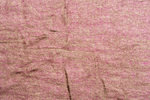 Pink color wrinkled fabric texture. Closeup — ストック写真