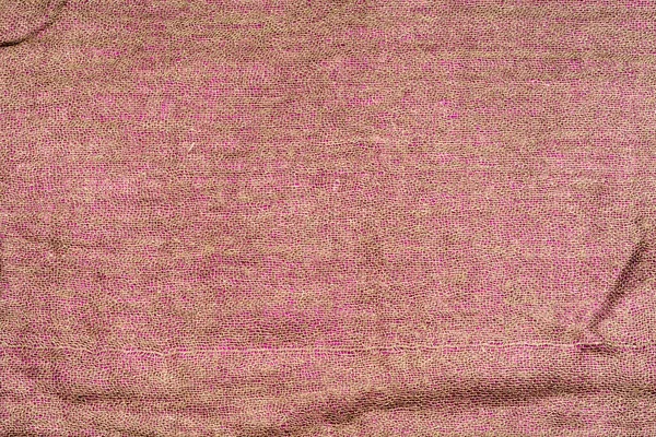 ピンク色のしわのある生地の背景 — ストック写真