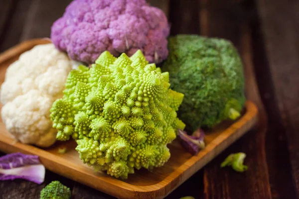 Fresh organic white and purple cauliflower, broccoli, romanesco — Stock Photo, Image