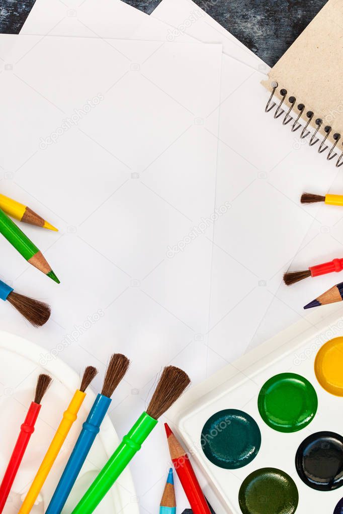 Paper, watercolor paints,  brushes for painting, colour pencils 