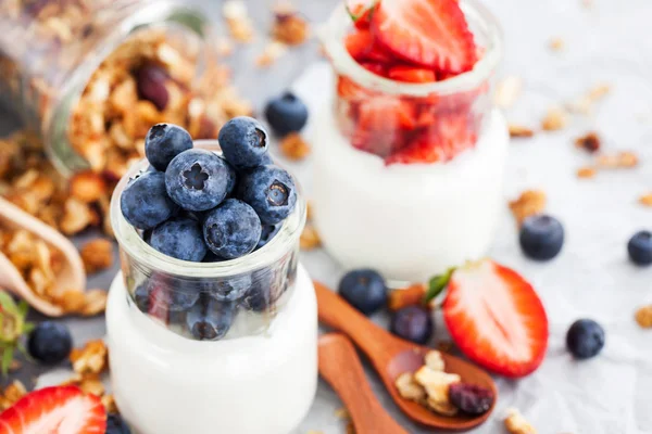 Delicious plain yogurt with fresh blueberry and strawberry in a — Stock Photo, Image