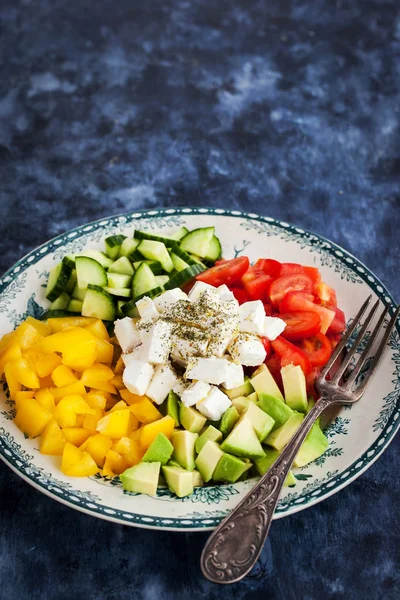 Delicious tomato, bell pepper, cucumber, avocado, onion and feta — Stock Photo, Image