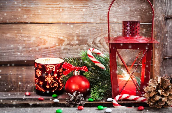 Christmas time red latern with candle light and holiday decorati — Stock Photo, Image